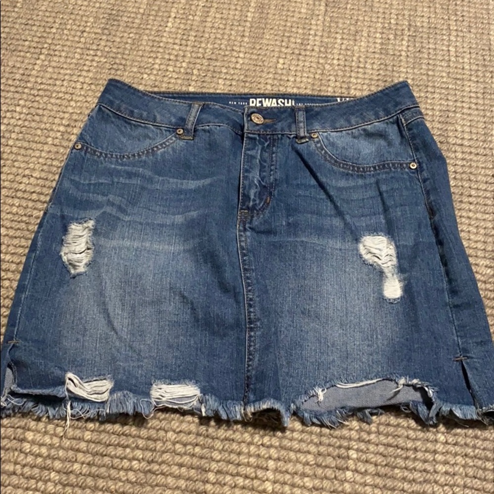 Denim skirt, middle of thigh length. Barely worn.